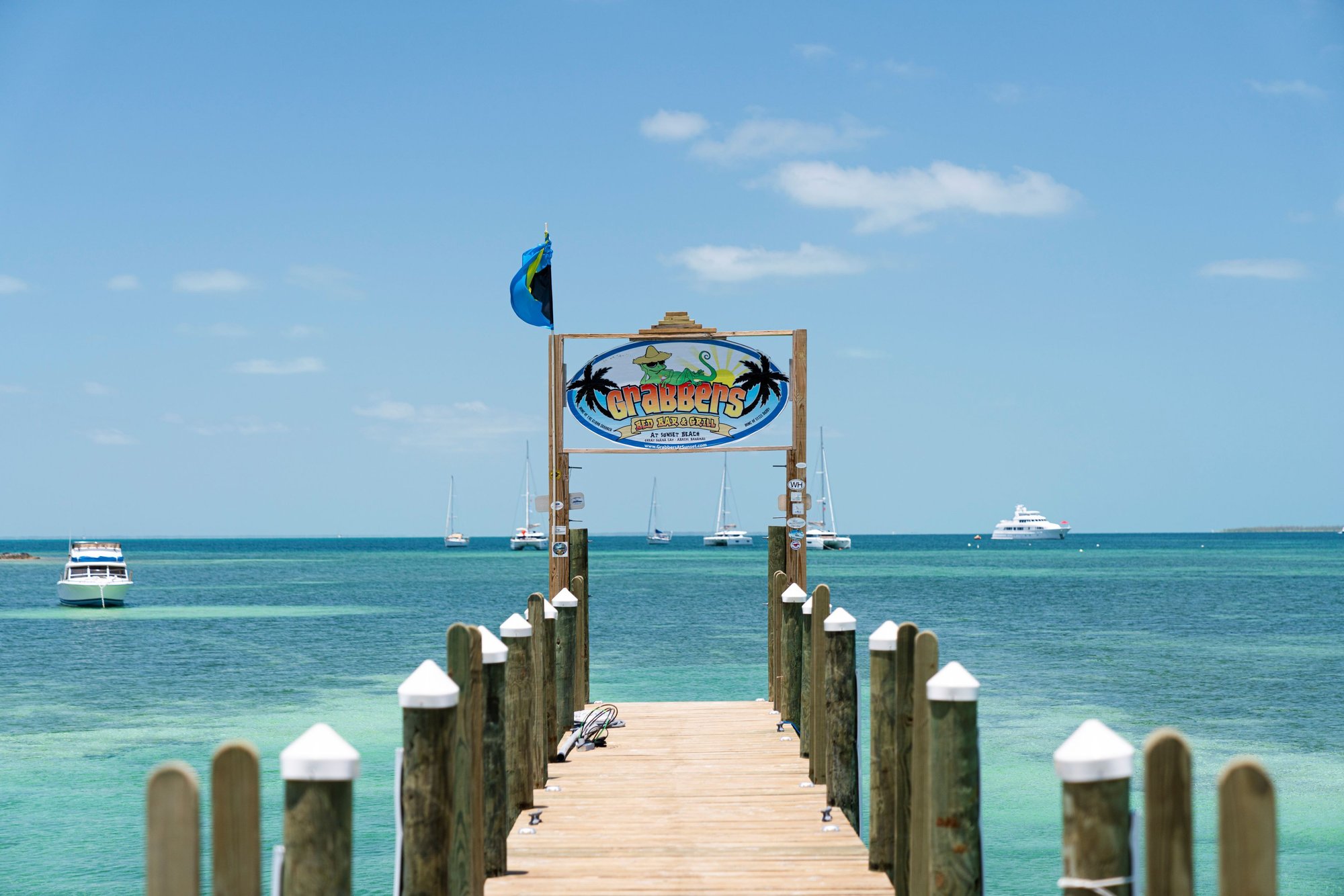 crabbers-beach-bar-sign-on-the-dock-abacos-bahamas crabbers-beach-bar-sign-on-the-dock-abacos-bahamas